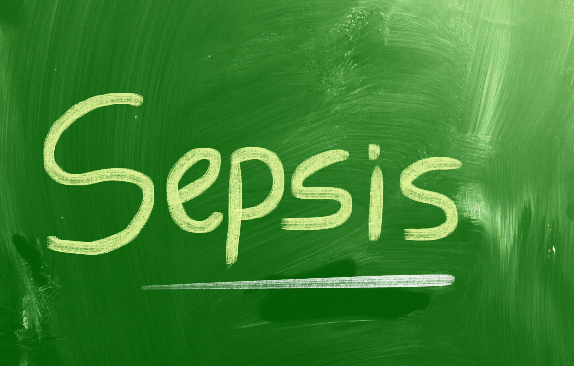 sepsis Bildet viser en grønn flate der det er skrevet ordet sepsis.